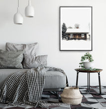 Load image into Gallery viewer, Black-framed Wooden Cabin Covered in Snow Poster