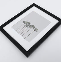 Load image into Gallery viewer, A framed photo print with palms