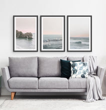 Load image into Gallery viewer, Three ocean photos in frames on a living room wall