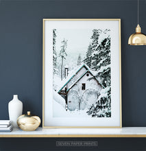 Load image into Gallery viewer, Gold-framed Winter Cottage House With a Snow Hat Photo Print