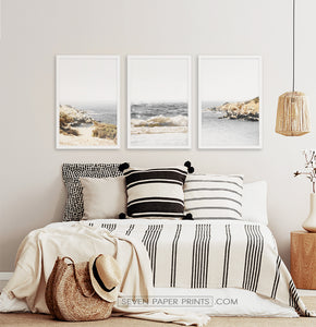 Three photo prints of sandy ocean shore in natural colors in black frames 2