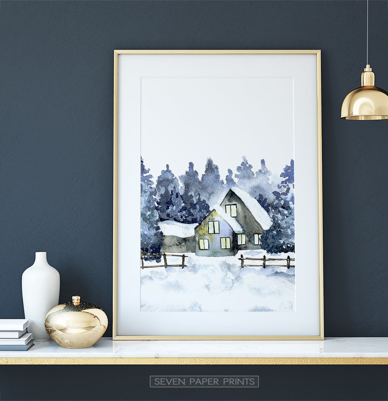 Golden-framed on a white marble shelf