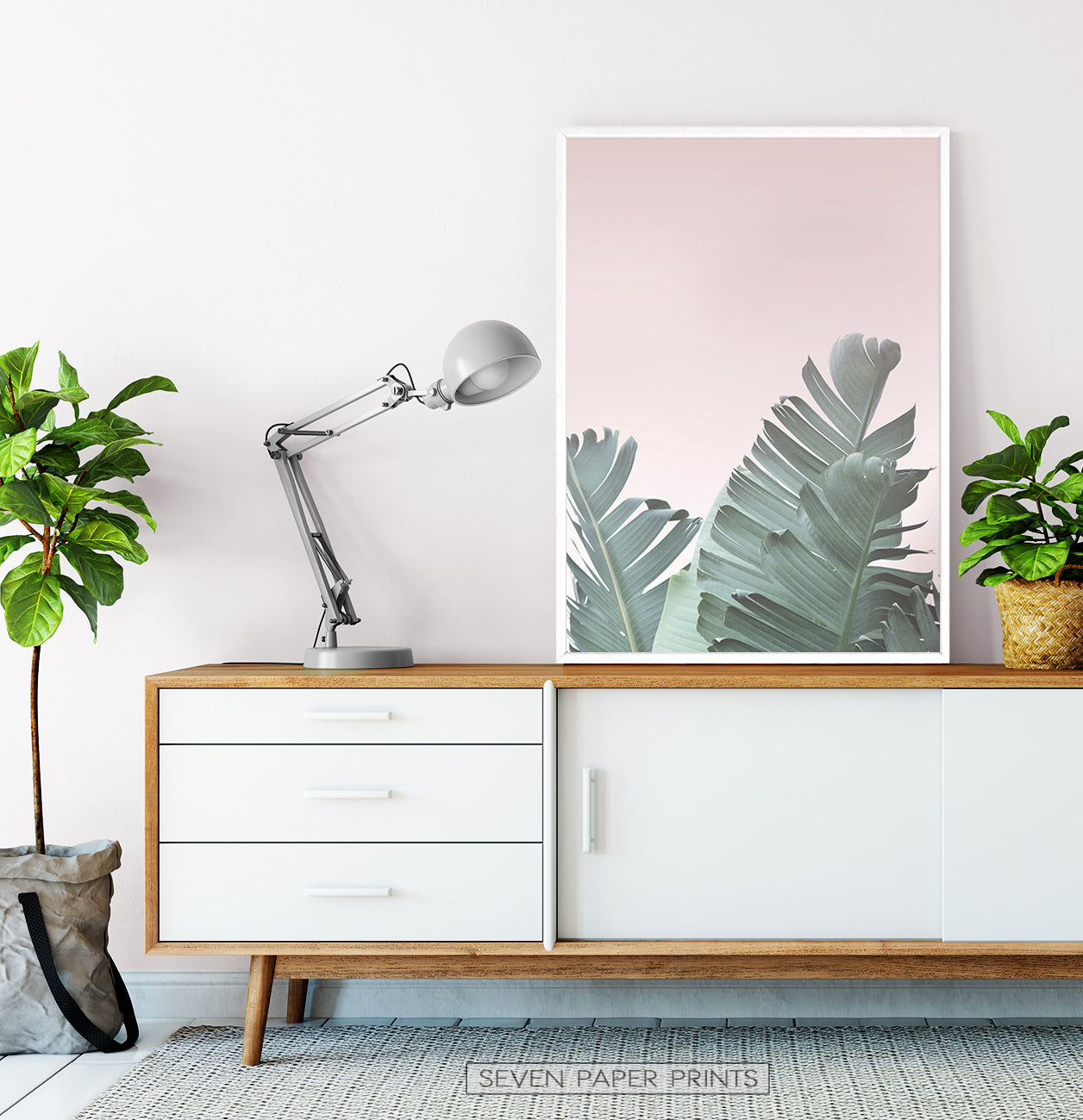 Green Banana Leaf on Pink Background