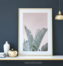 Load image into Gallery viewer, Banana Leaves on Pink Tropical Decor on Dark Wall
