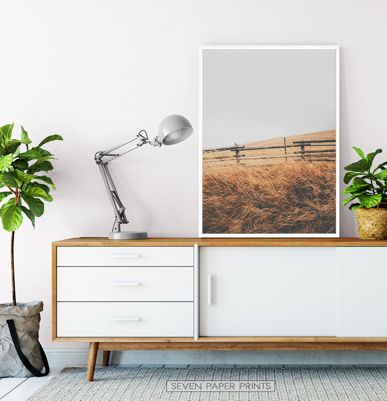 White-framed on a wooden cabinet
