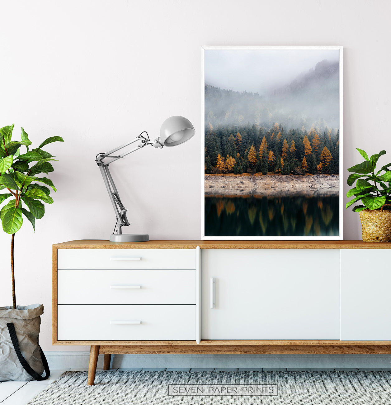 White-framed on a wooden cabinet
