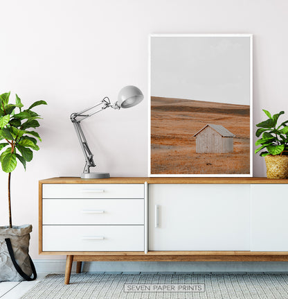 White-framed on a wooden cabinet