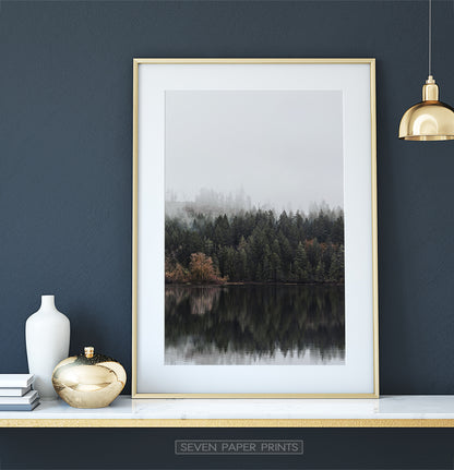 Golden-framed on a white&gold marble shelf