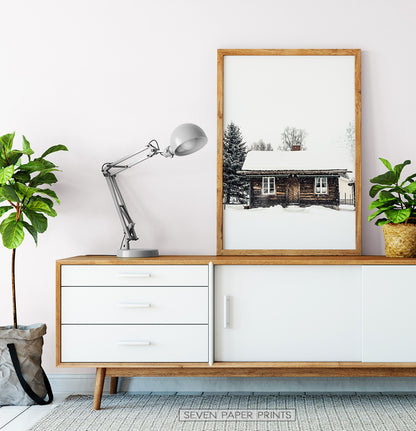 Wood-framed Wooden Cabin Covered in Snow Poster