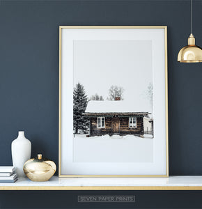 Gold-framed Wooden Cabin Covered in Snow Poster