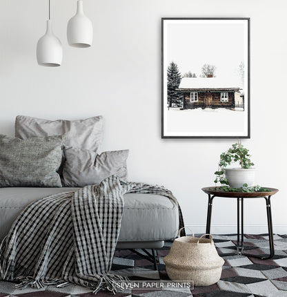 Black-framed Wooden Cabin Covered in Snow Poster