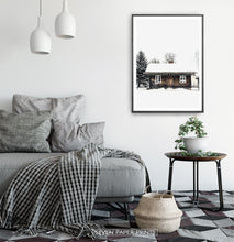 Load image into Gallery viewer, Black-framed Wooden Cabin Covered in Snow Poster
