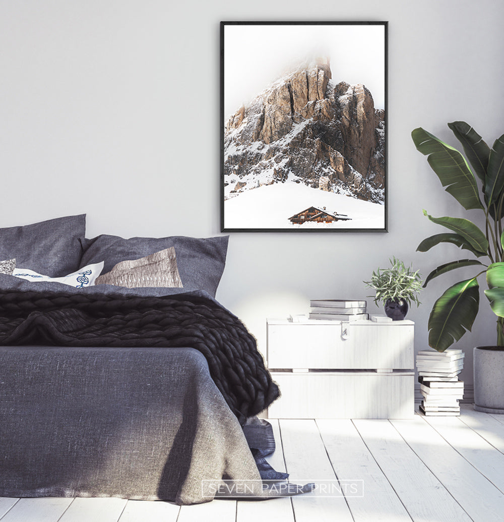 Black-framed Snowy House Under A Cliff In The Mountains Wall Art