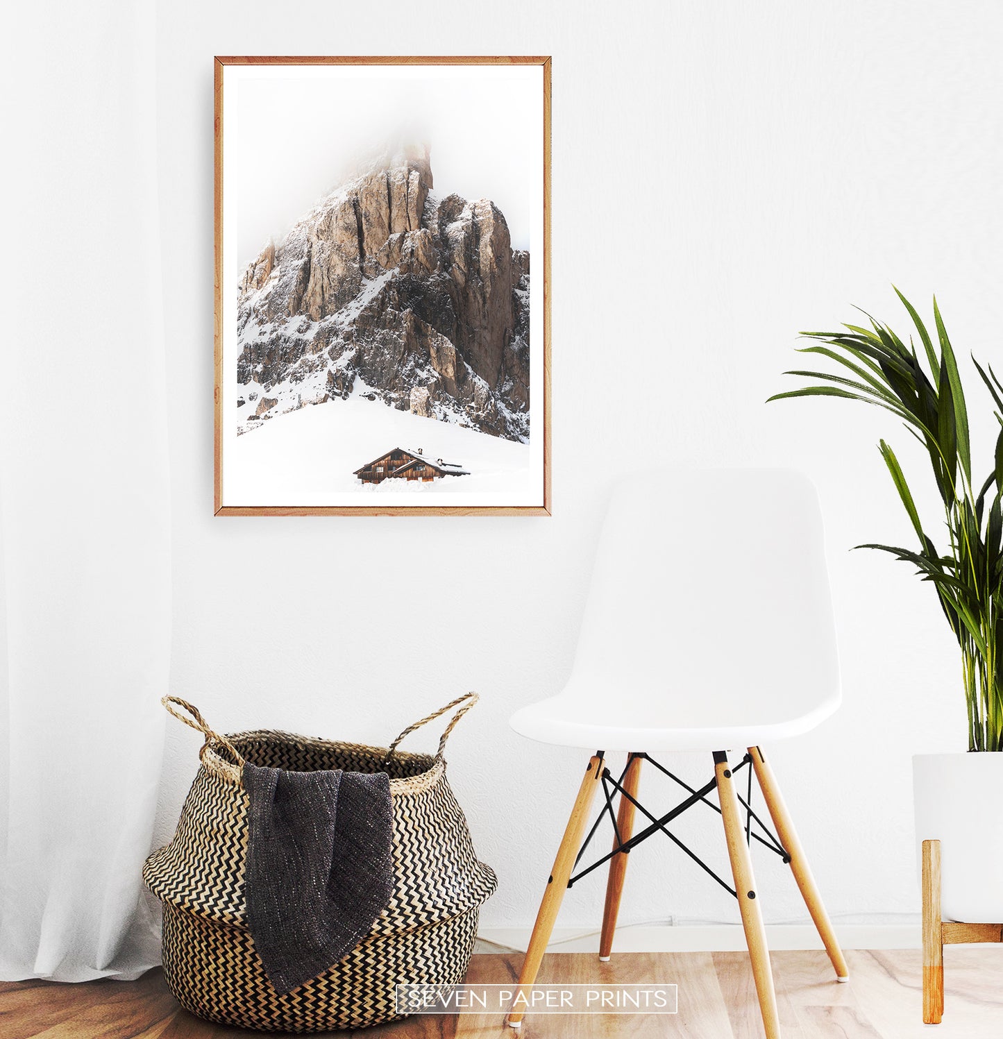 Wooden-framed Snowy House Under A Cliff In The Mountains Wall Art