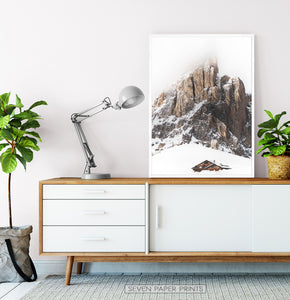White-framed Snowy House Under A Cliff In The Mountains Wall Art