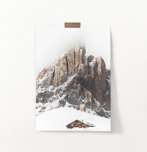 Snowy House Under A Cliff In The Mountains Wall Art