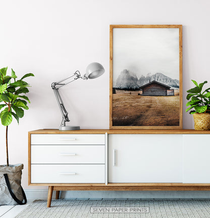 White-framed on a wooden and white cabinet