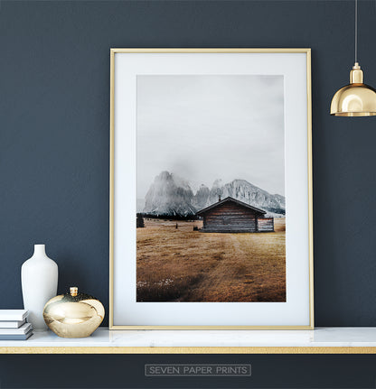 Gold-framed on white marble shelf