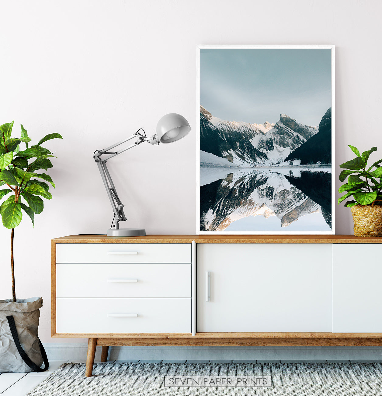 White-framed on a wooden cabinet