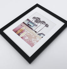 Load image into Gallery viewer, A bright pink photo print of California beach house and surfing boards
