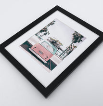 Load image into Gallery viewer, A bright pink aerial photo print of a surfing miniwan in a black frame
