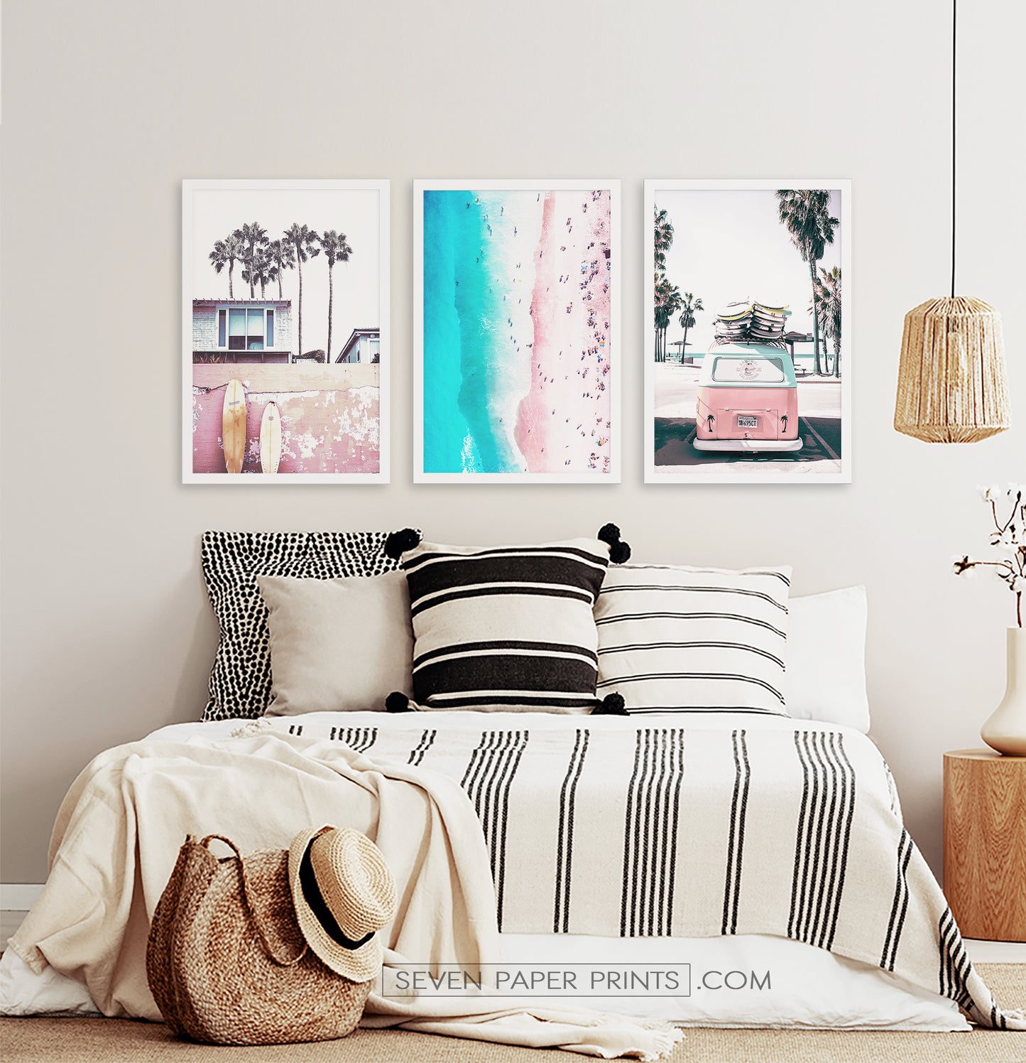 Three photo prints of California beach house, surfing boards, a coast and a surfing miniwan in white frames