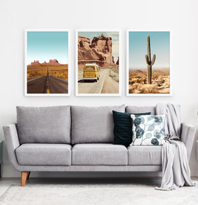 Three framed photo prints of a Great Canyon highway, miniwan and a cactus