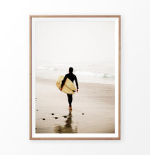 Load image into Gallery viewer, Surfer with yellow surfboard walking toward ocean
