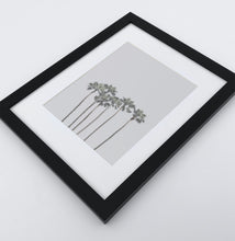 Load image into Gallery viewer, A framed photo print with palms
