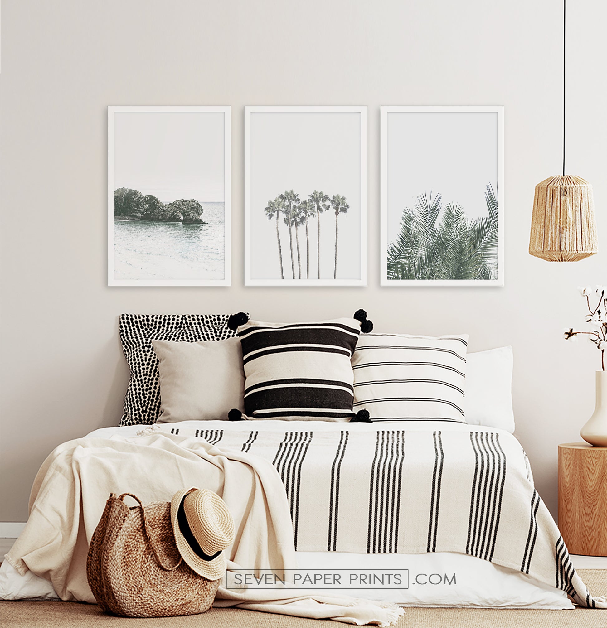 Three framed photo prints with a rock and some palms 3