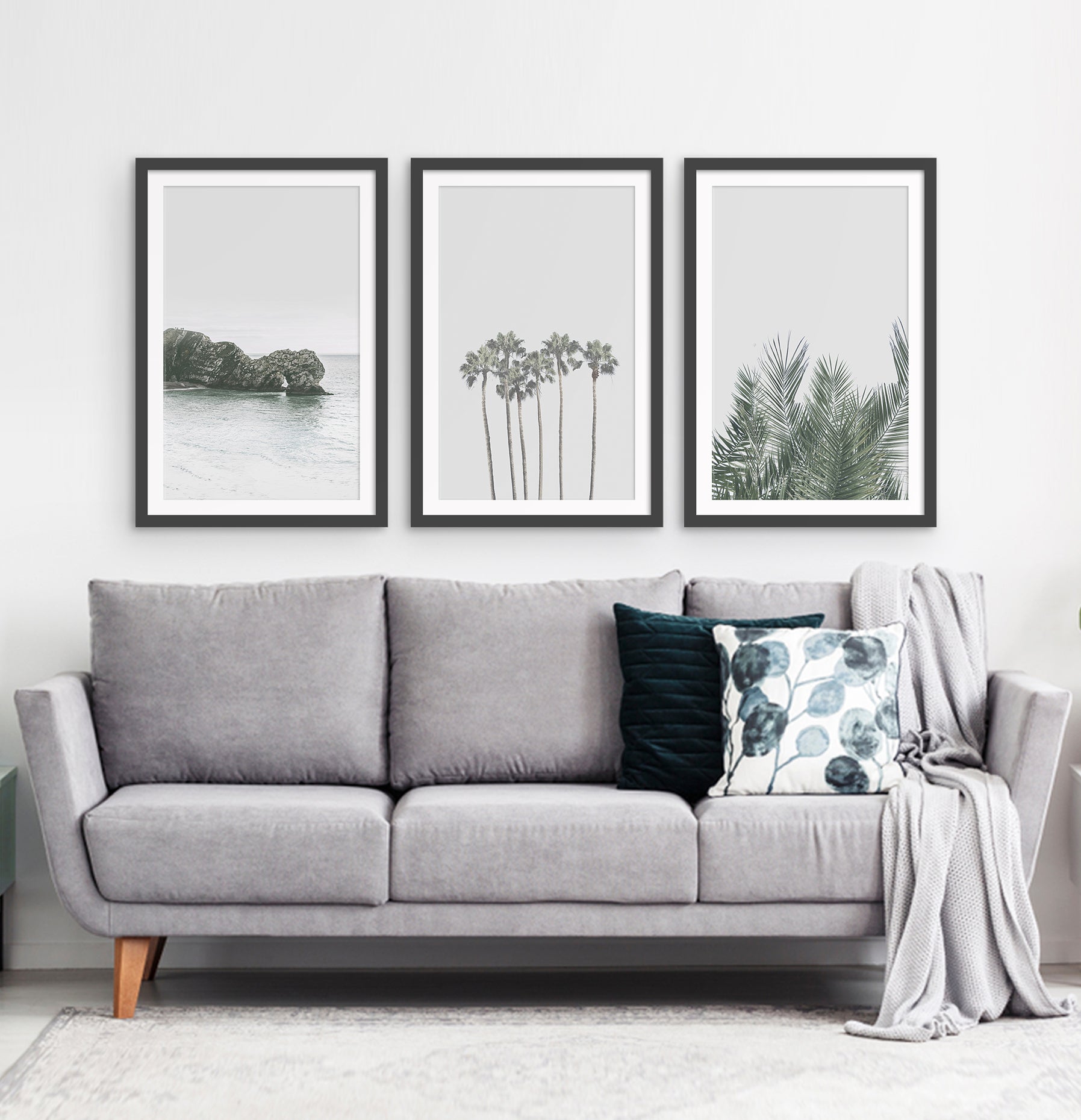 Three framed photo prints with a rock and some palms 2