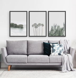 Three framed photo prints with a rock and some palms 4
