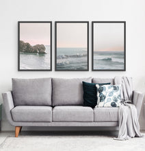 Load image into Gallery viewer, Three ocean photos in frames on a living room wall 2
