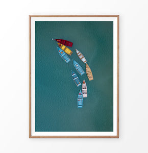 Colored Fishing Boats on Waves