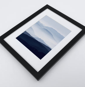 A framed Print of a Foggy Mountain Landscape 2