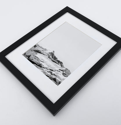 A photo print of snowy mountains