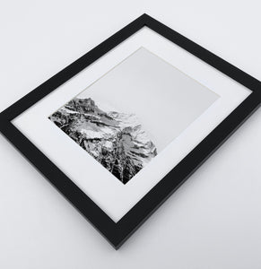 A photo print of snowy mountains