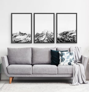 Three photo prints of snowy mountains 3