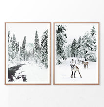 Load image into Gallery viewer, Winter Scene Set of 2 prints. Reindeer, river and pine trees in snow
