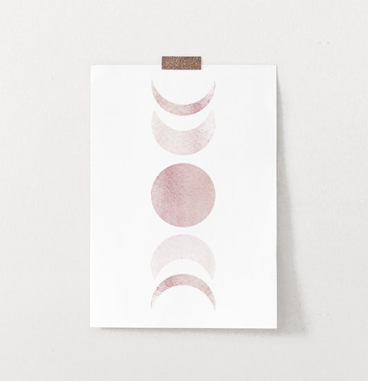 Frameless Moon Phases Watercolor Print in Bage and Brown on a wall