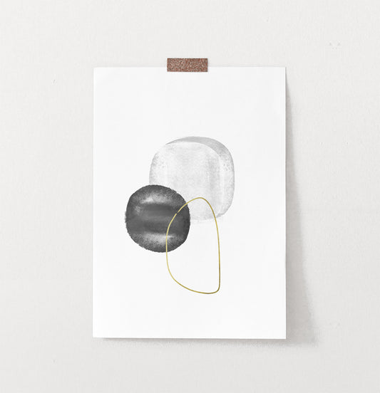 A wall art with black, silver and golden forms