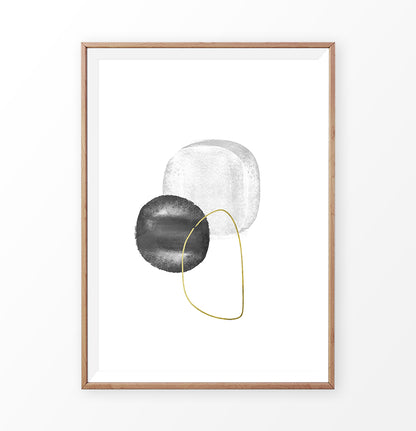 A brown-framed wall art with black, silver and golden forms
