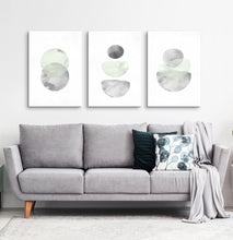 Load image into Gallery viewer, Three Abstract Green and Gray Watercolor Art Prints above the sofa
