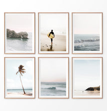 Load image into Gallery viewer, Coastal Wall Art Prints. Beach with palm trees and surfer. Ocean rock
