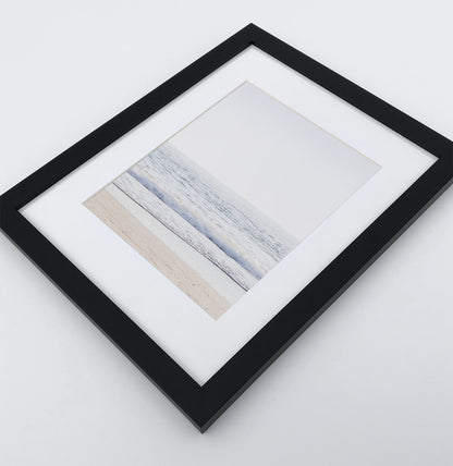A framed photo print with ocean