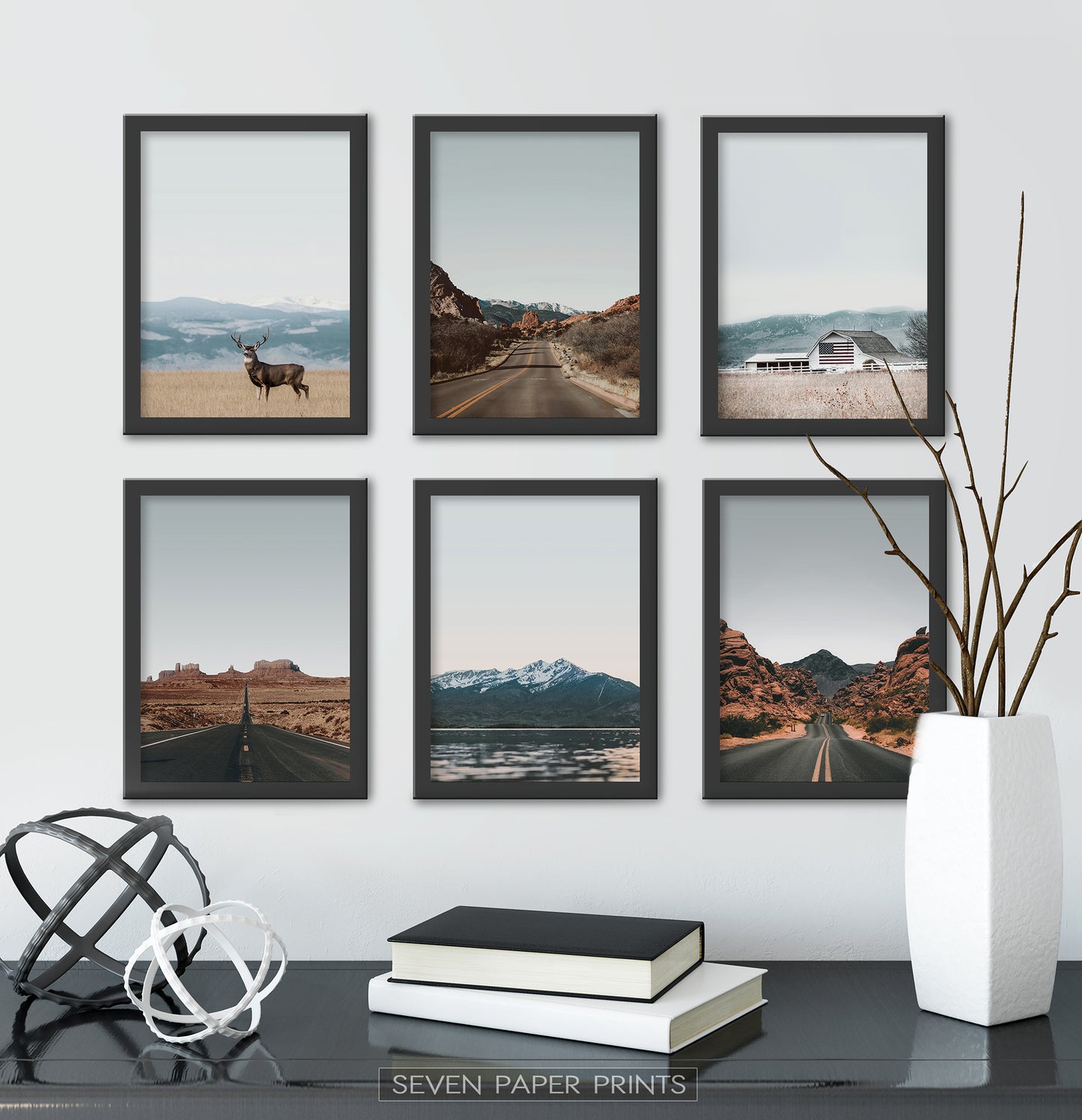 Black-framed above the black table