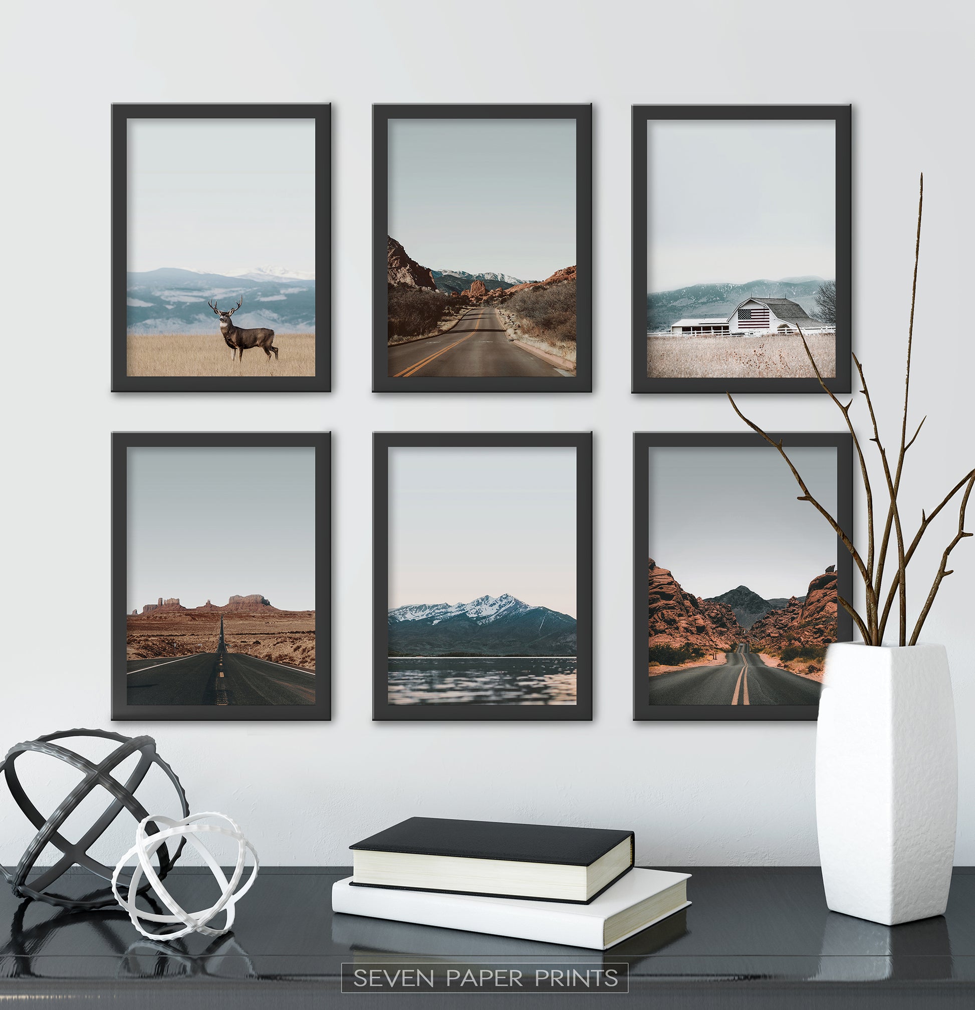 Black-framed above the black table