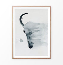 Load image into Gallery viewer, A smudged bull skull watercolor painting print in a frame
