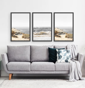 Three photo prints of sandy ocean shore in natural colors in black frames 3