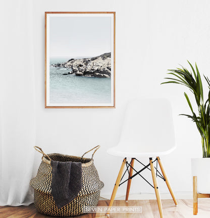 Ocean print for empty wall near the chair